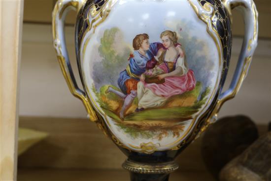 A pair of 19th century French porcelain urns, H 33cm